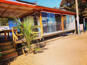 Casa charmosa pé na areia por do sol